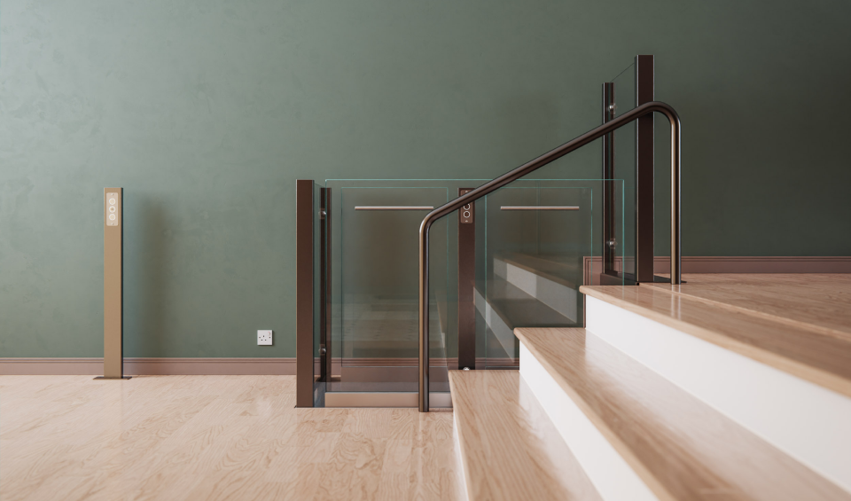 a set of stairs with glass railings in a room.