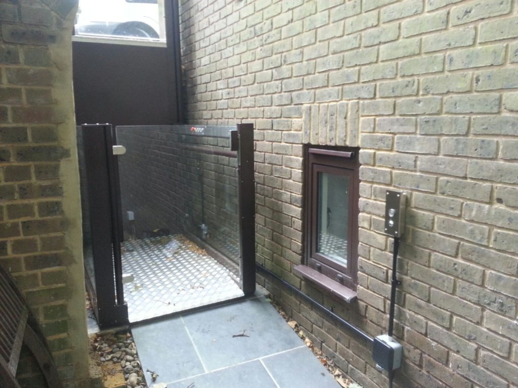 Open Style Platform Lift on Side Of House