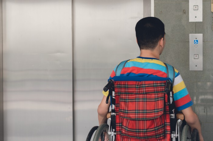 Wheelchair Student Waiting for the Lift